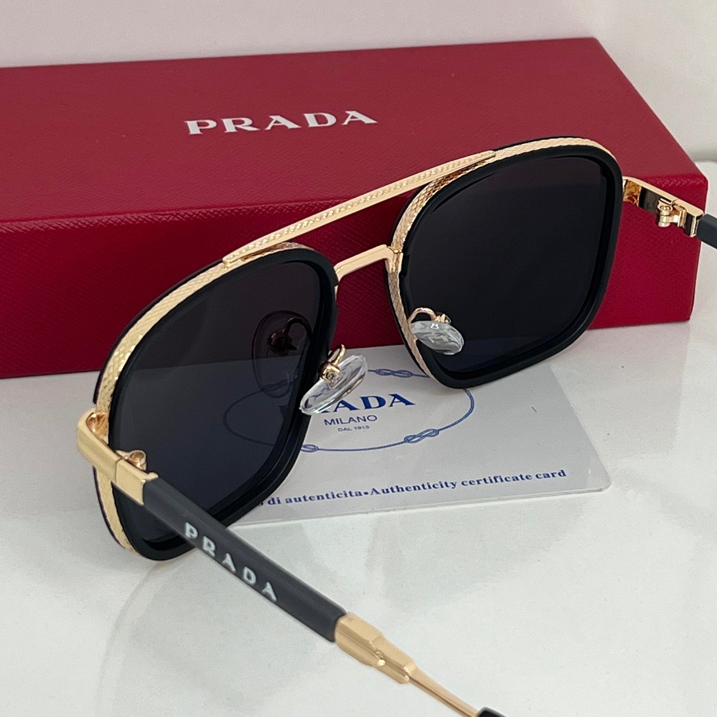 Lunettes Prada Noir Gold