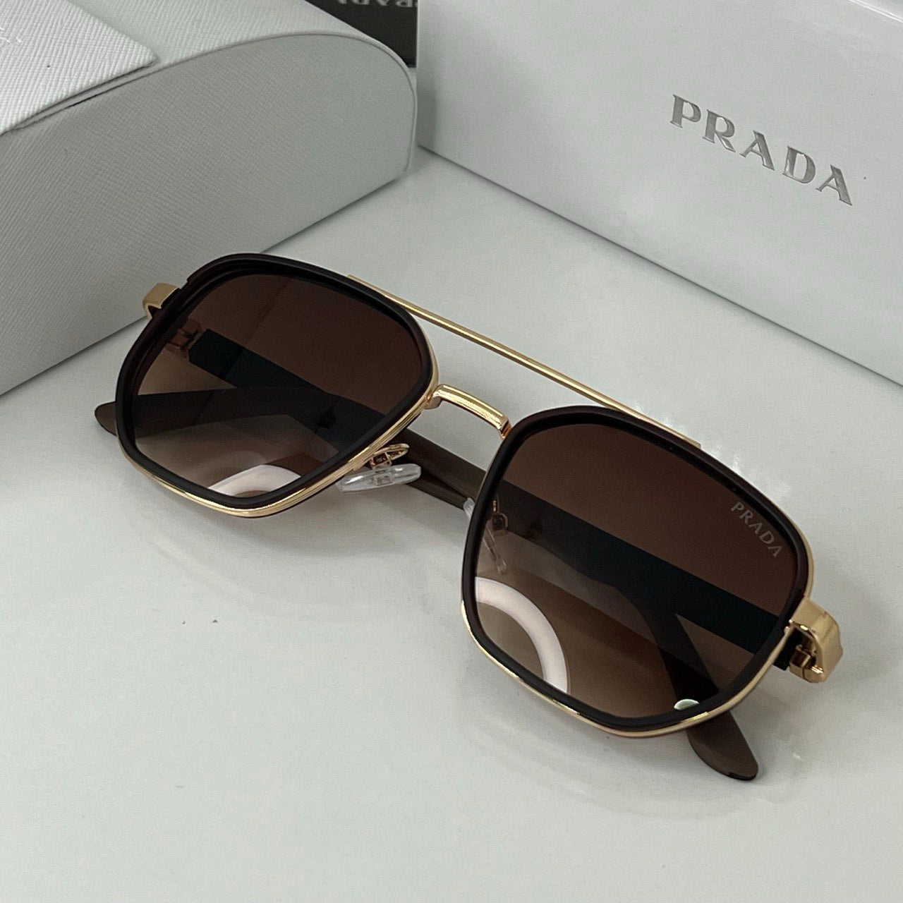 Lunettes Prada Marron