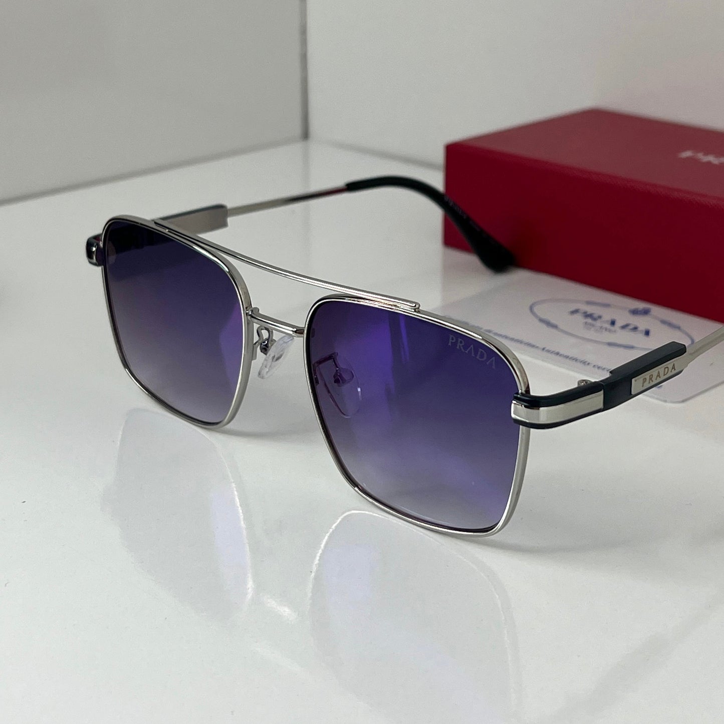 Lunettes Prada Bleu/Argente