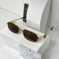 Lunettes Prada Marron