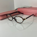 Lunettes Miw Miw