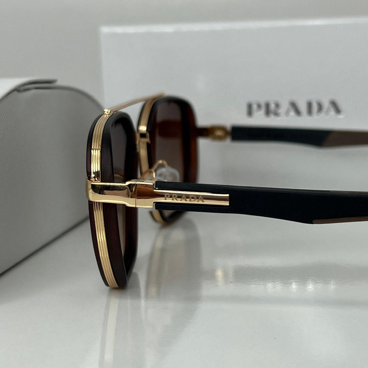 Lunettes Prada Marron