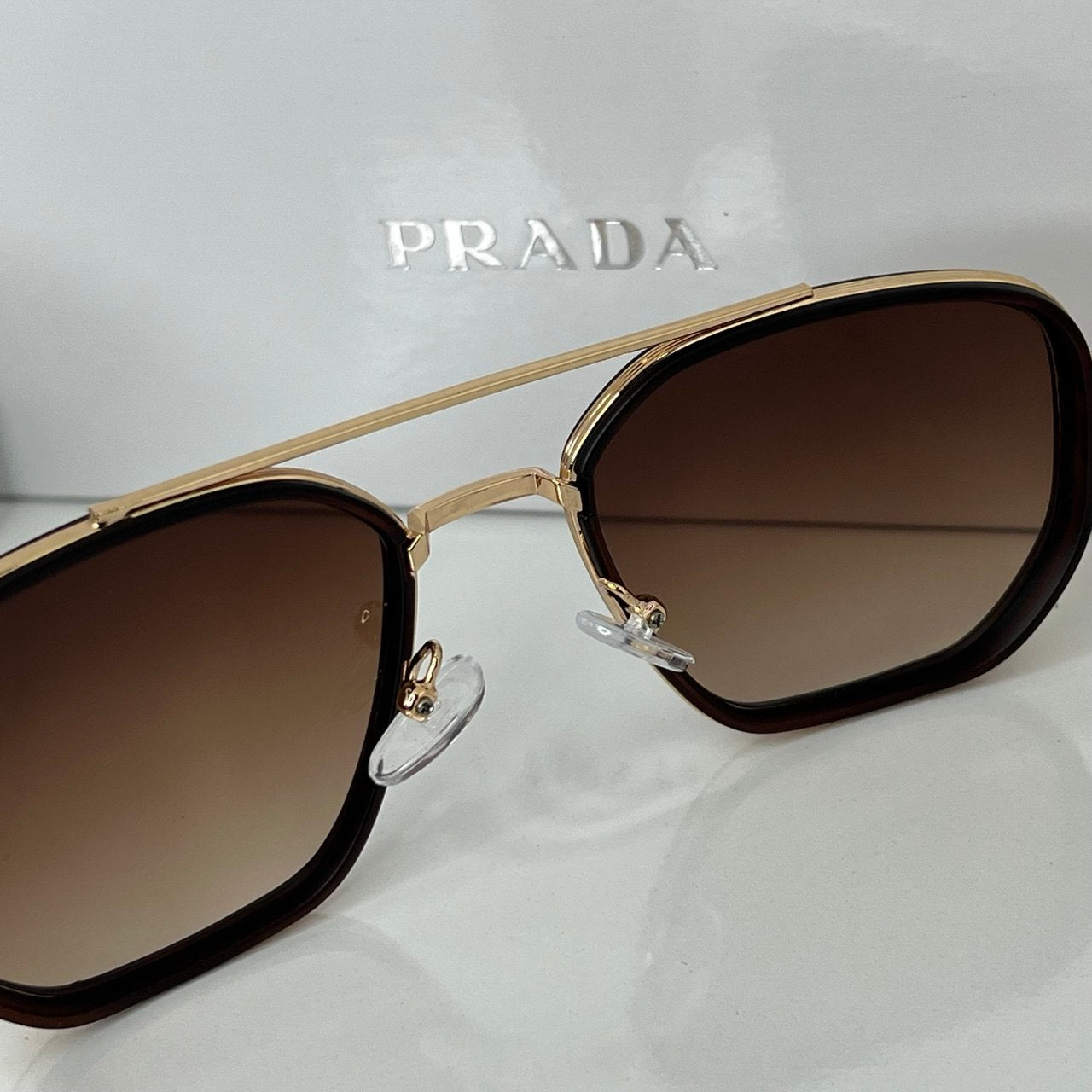 Lunettes Prada Marron
