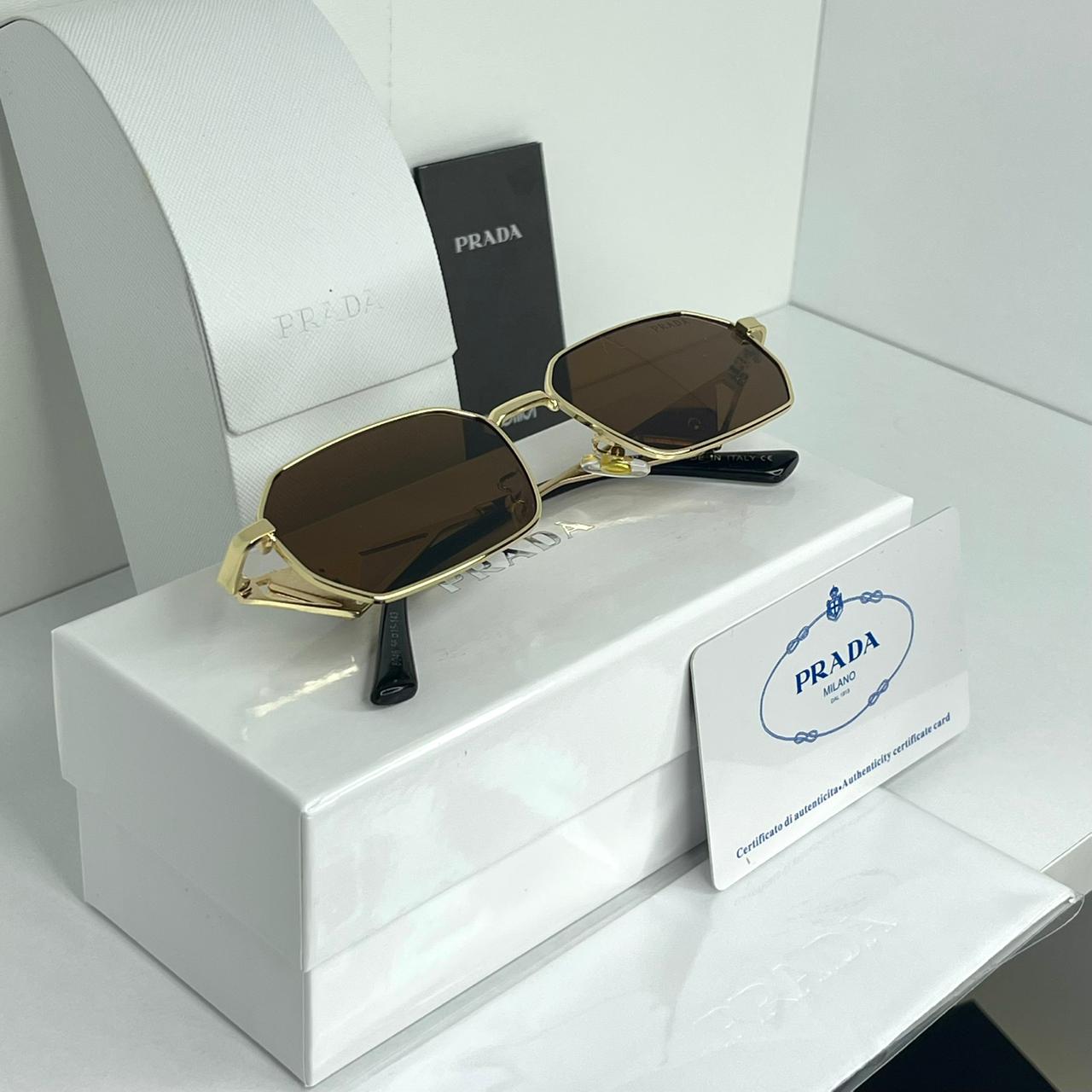 Lunettes Prada Marron