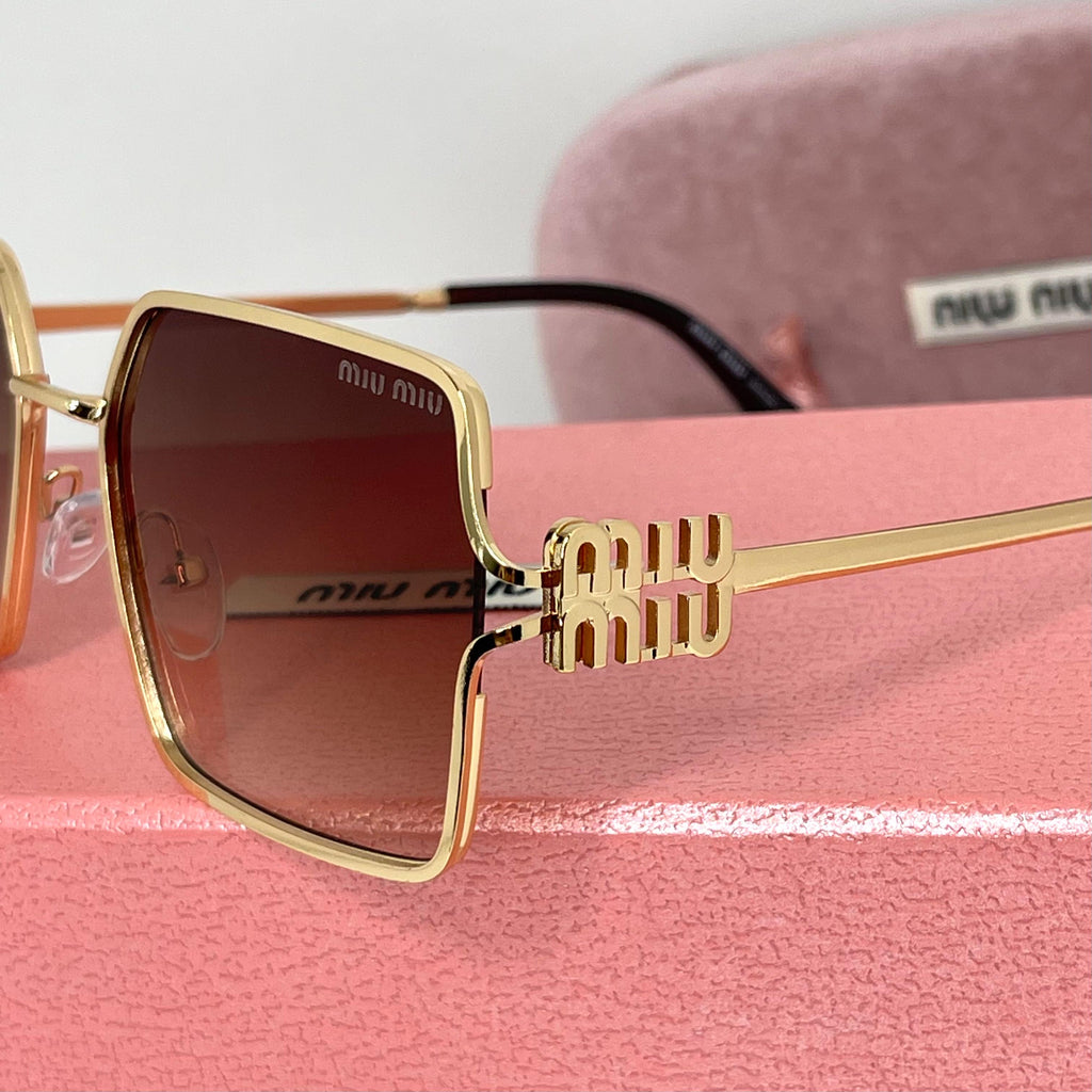 Lunettes Miu Miu Luxe Gold