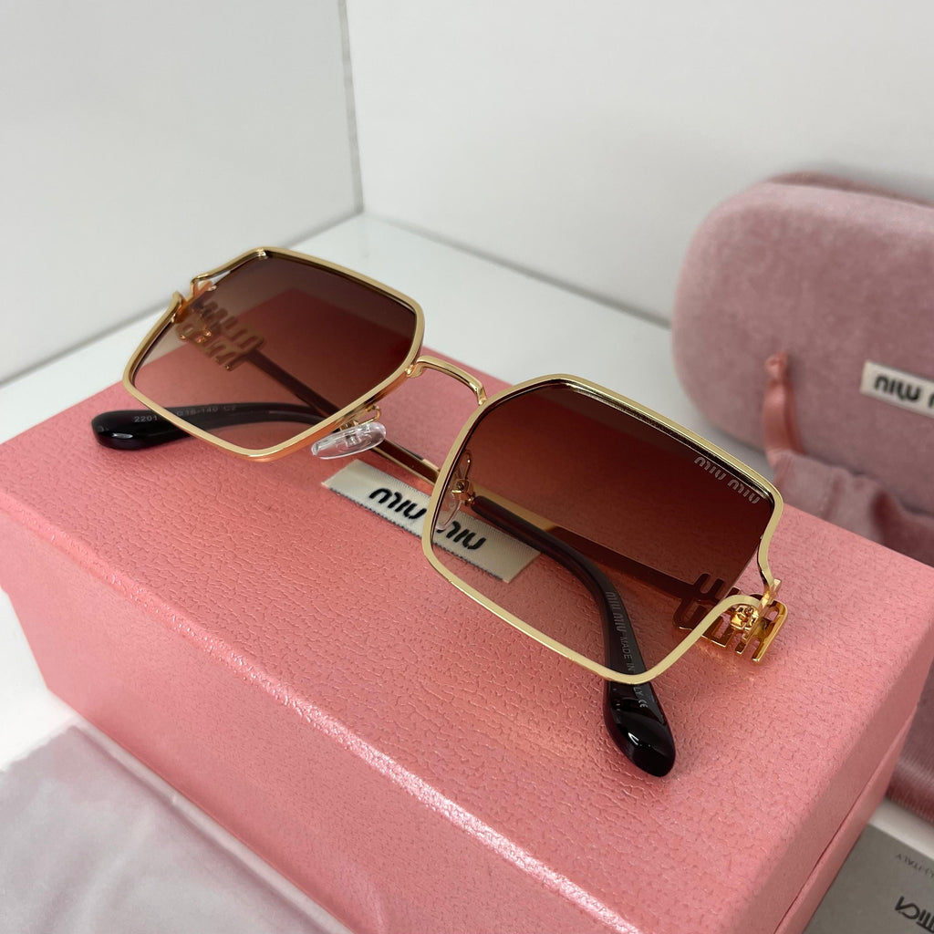Lunettes Miu Miu Luxe Gold
