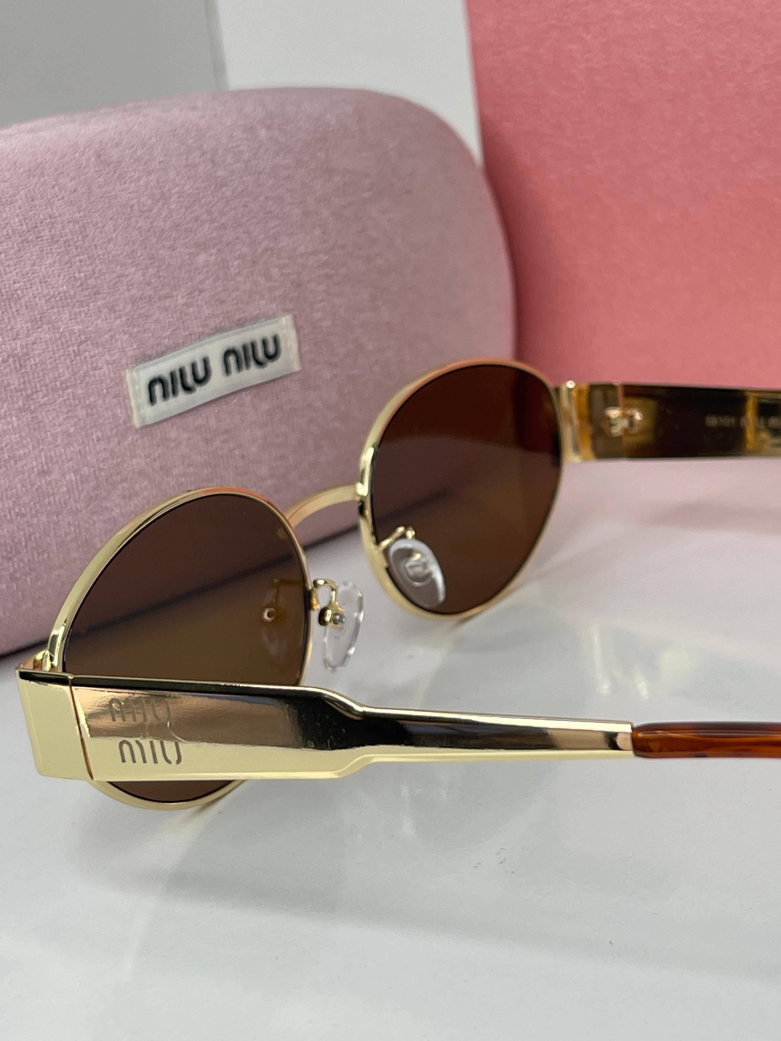 Miu Miu Vision Gold