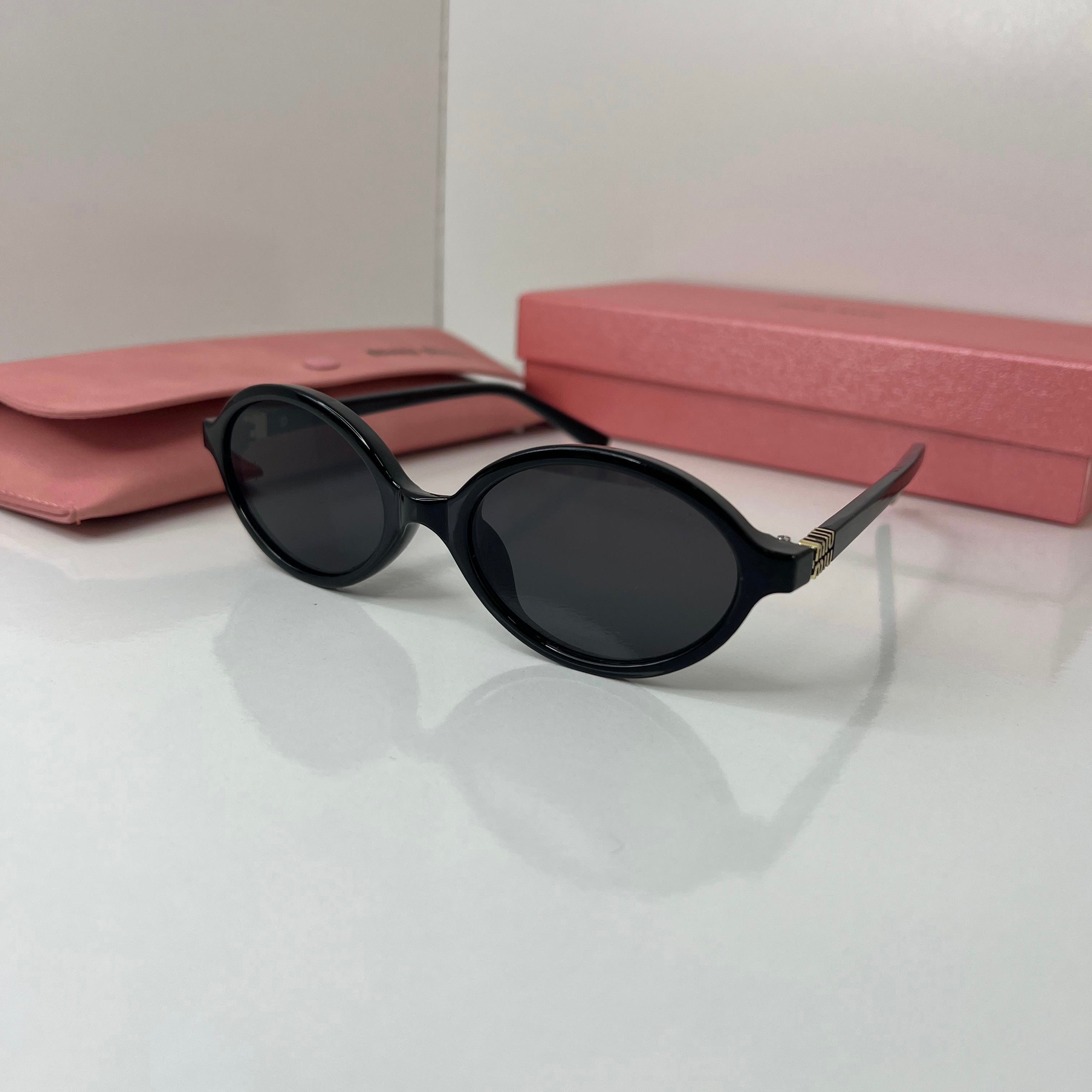 Lunettes Miw Miw Noir