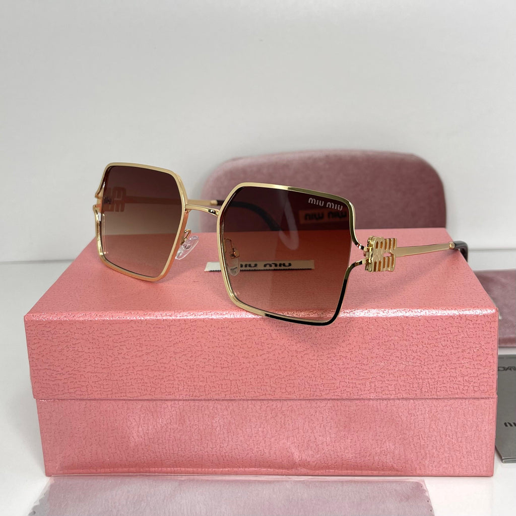 Lunettes Miu Miu Luxe Gold