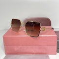 Lunettes Miu Miu Luxe Gold