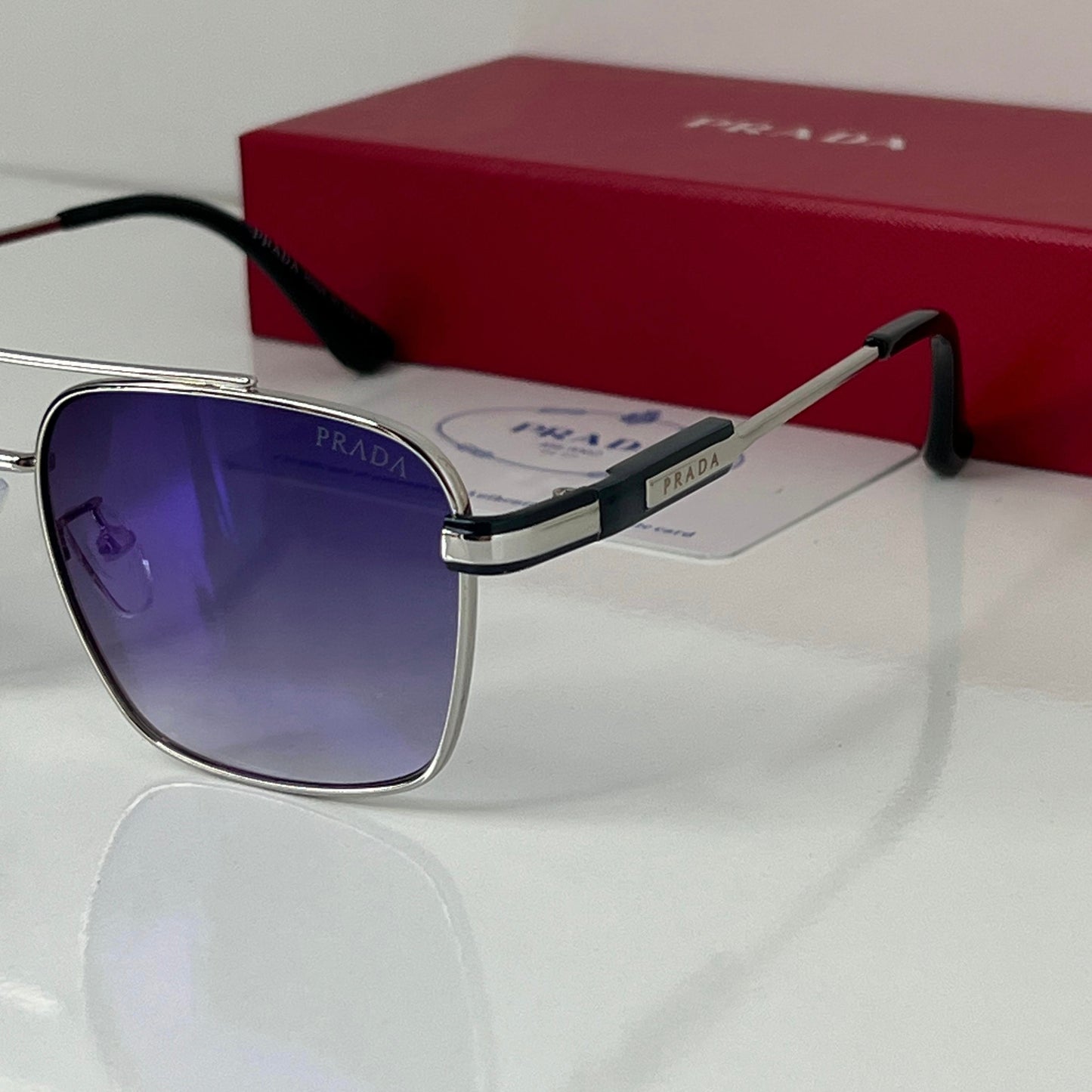 Lunettes Prada Bleu/Argente