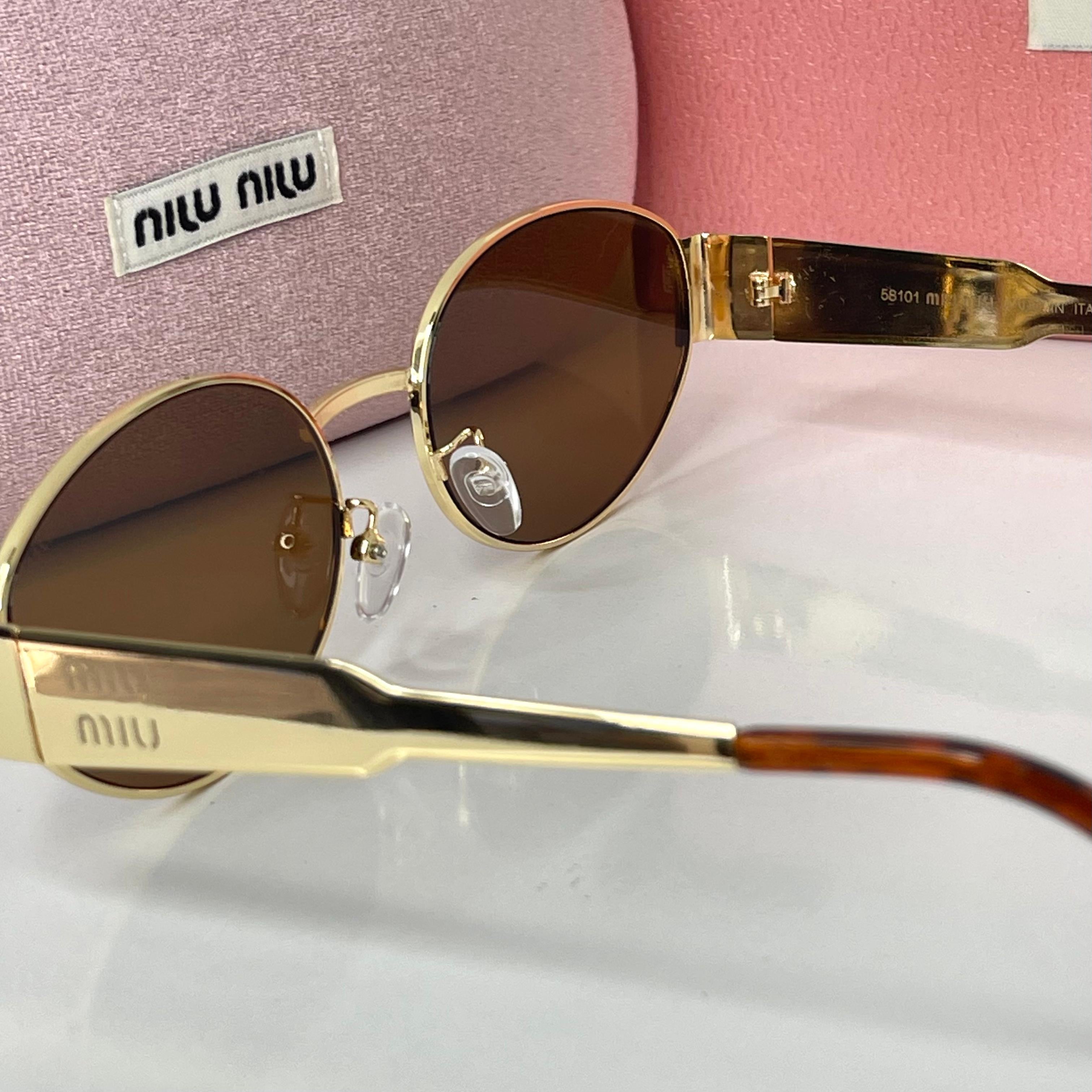 Miu Miu Vision Gold